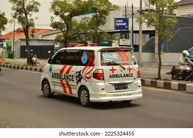 Indonesia - October 29, 2022: Ambulance Driving On Busy Highway Fast, Ambulance On Emergency Mission