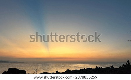Indonesia Origin, Manado City, North Celebes Sea at Sunset with Blue and Orange Sky