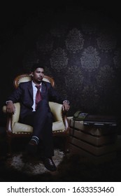 INDONESIA, Pontianak - 29 January 2020: Photo Studio - A Man Entrepreneur Who Is Dashing In His Black Suit (Graduation Photo) 