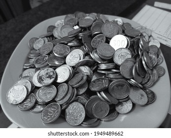 Indonesian Coins For Coins In Denominations Of Rp. 100, Rp. 200 And Rp. 500 Rp. 1000. The Raw Materials Are Nickel And Aluminum. Used As A Medium Of Exchange In Indonesia.