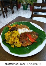 Indonesian Dish : Nasi Kapau Is A Minang steamed Rice topped With Various Choices Of dishes.