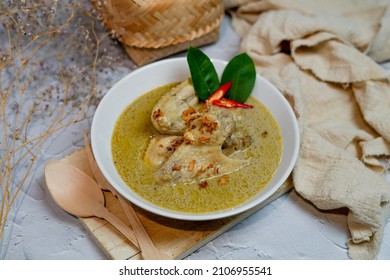 Indonesian famous food for celebrate Idul Fitri  Lebaran, Opor Ayam (Indonesian White Curry), Chicken cooked in coconut milk and spices