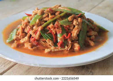 Indonesian Food Called Sambal Goreng Tahu Kapri On Wooden Table

