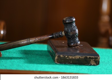 Indonesian Judicial Gavel On The Judge's Table. Concept Legal Zone In The Punishment System. Judgment Of Judgment Concept Of Punishment And Pardon. Symbol Of Law Is The Hammer Of Judge.