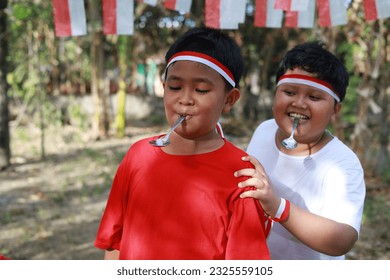 Indonesian kids celebrate Indonesia independence day with outdoor contest