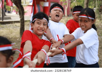 Indonesian kids celebrate Indonesia independence day with outdoor contest