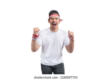 Indonesian men celebrate Indonesian independence day on 17 August isolated over white background - Shutterstock ID 2183097753