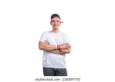 Indonesian men celebrate Indonesian independence day on 17 August isolated over white background - Shutterstock ID 2183097755