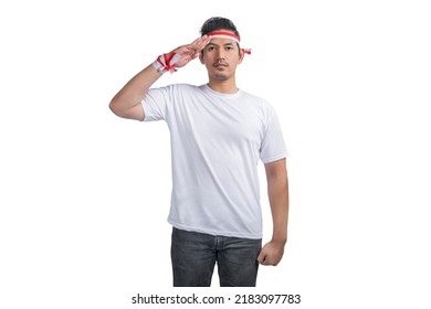Indonesian men celebrate Indonesian independence day on 17 August with respectful gestures isolated over white background