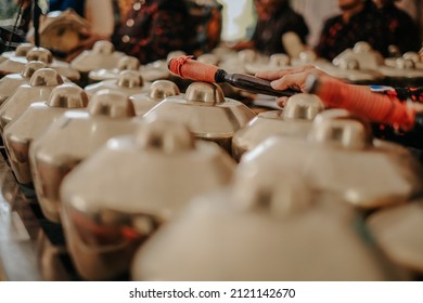 Indonesian musical instruments, Gamelan, drums and gongs. Background, space cross. - Shutterstock ID 2121142670