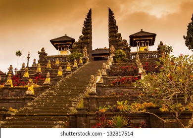 indonesian old temple pura Besakih on a cloudy sunset background. Bali.