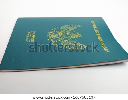 Indonesian passports are green, white background
