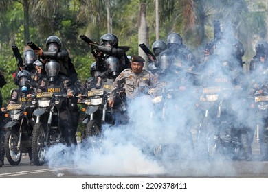 Indonesian Riot Police Fire Tear Gas During An Election Security Simulation Exercise In Front Of The Election Commission Office In Bengkulu, Indonesia, February 13, 2014