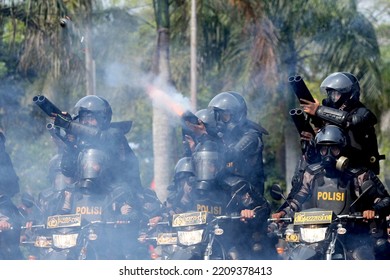 Indonesian Riot Police Fire Tear Gas During An Election Security Simulation Exercise In Front Of The Election Commission Office In Bengkulu, Indonesia, February 13, 2014