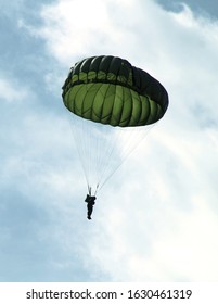 Indonesian Special Forces Paratrooper Jumping From A Plane