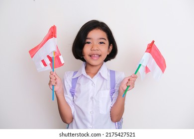 Indonesian Student Showing Happy Expression When Holding Nation Flag