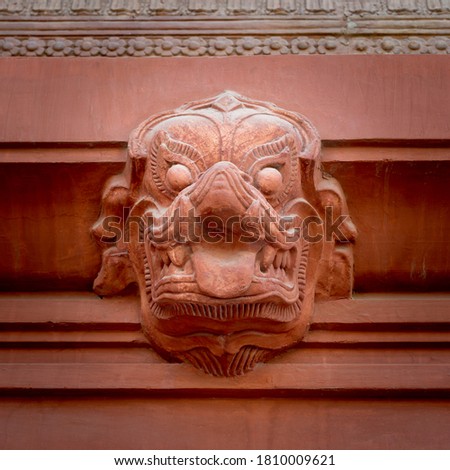 Indonesian style Hindu stone sculpture carved on the external wall of historical palace of Baron Empain, located in Heliopolis district, Cairo, Egypt