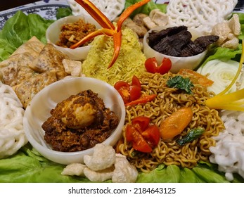 Indonesian Traditional Foods For Celebration. Nasi Kuning Komplit Ulang Tahun.