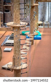 Indoor Adventure Park With Masts, Platforms And Climbing Ropes