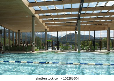 Indoor Architecture Of Public Swim Bath With Laps And Glass Roof