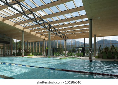 Indoor Architecture Of Public Swim Bath With Laps And Glass Roof