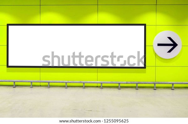 indoor car parking and empty white billboard
.Blank space for text and
images.