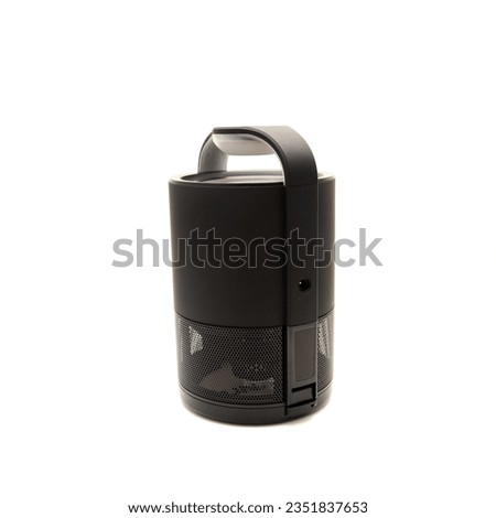 Indoor fly and mosquitos trap using electric to simulate heat and wavelengths with bottom sticky glue boards to kill insects isolated on white background. Pests and mosquito zapper clipping path
