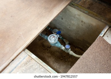 Indoor Hot Water Meters Used For Measuring Consumption Of Water In Buildings And Houses. In Crawl Space