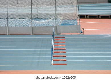 Indoor Hurdlers Race Track Sport And Athletics Concepts