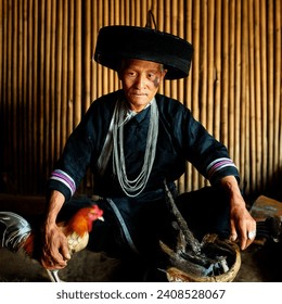 Indoor photo of hmong man shaman, spiritual healing, wears plain black and white clothes, black hat, bamboo temple, fantasy, chicken, pig