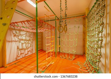 Indoor Playroom For Children With Rope Ladders. Kids Jungle Gym .