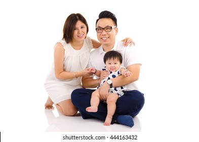 Indoor Portrait Of Asian Family