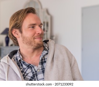 Indoor portrait of a young attractive guy - Powered by Shutterstock