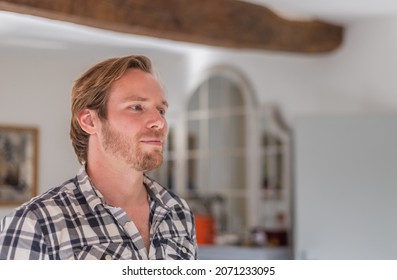 Indoor portrait of a young attractive guy - Powered by Shutterstock