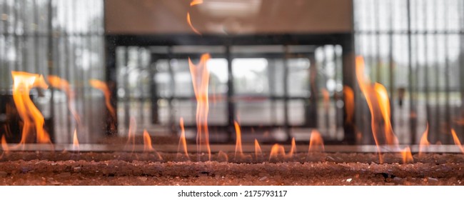 Indoor See-through Gas Fireplace Feature, High-end Luxury Living Room Installation, Abstract Background Image With Blurred  Windows In The Back