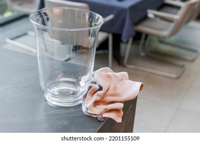 Indoor Shot Of A Glass Vase And Kitchen Towel On The Table Table, No People 