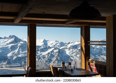 Indoor Shot Of The Table Decoration Inside Of The Restaurant That Have Exotic Scenery Of Titlis Ice Mountain In Switzerland During Summer Season. Travel Destination, No People.