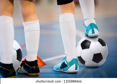 Indoor Soccer Players Training With Balls. Indoor Soccer Sports Hall. Football Futsal Player, Ball, Futsal Floor. Sports Background. Futsal League. Indoor Football Players With Classic Soccer Ball.