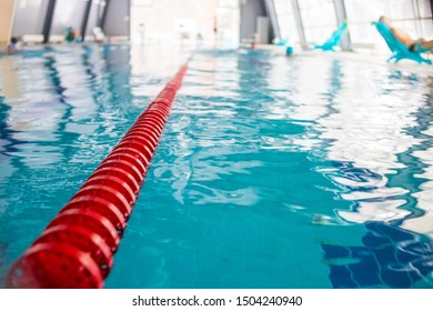 Indoor Swimming Pool, Healthy Concept.swiming Pool For Competition.pool With Swim Lanes. Sport And Enjoyment. Relaxation,recreation And Sports Training