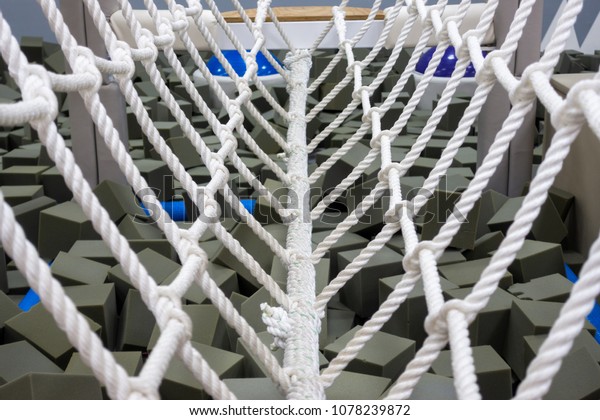 Indoor\
walk bridge with side rope protection on\
handrails