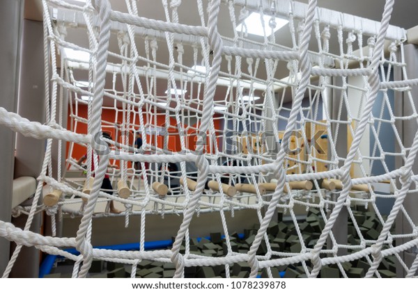 Indoor\
walk bridge with side rope protection on\
handrails