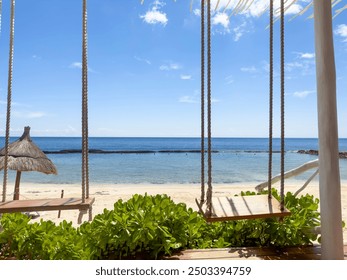 Indulge in the ultimate coastal chic experience at this stylish Riviera Maya beach bar. Lounge in a hammock, soak up the sun, and enjoy panoramic views of the turquoise waters. - Powered by Shutterstock