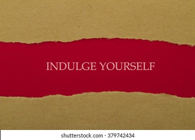 Indulge Yourself Message Written Under Torn Paper.