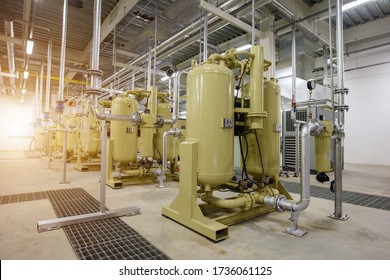 Industrial air compressor systems with equipment machinary, tank, pump, gauge, valve, electric supply, and piping systems into the supply manufactering process of the plant