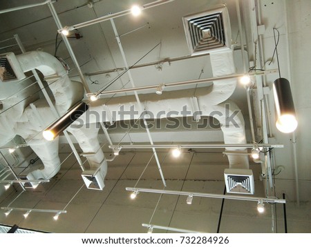 Industrial of air condition system of pipes and fans on ceiling
