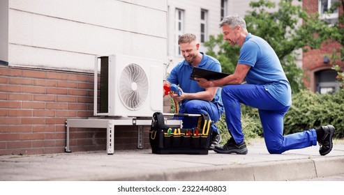 Industrial Air Conditioning Technician. HVAC Cooling System Repair - Shutterstock ID 2322440803