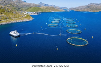 Industrial aquaculture salmon farm in Norway seen from the air