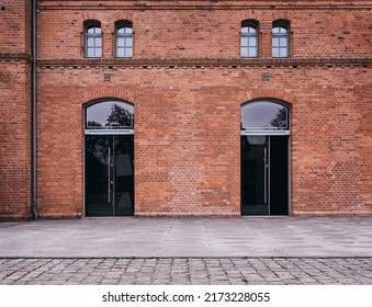 Industrial background, empty grunge urban street with warehouse brick wall - Powered by Shutterstock