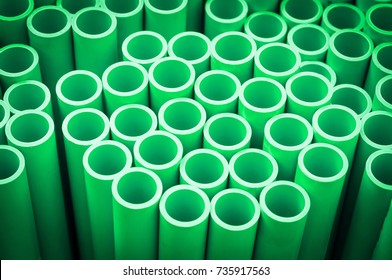Industrial background with Green plastic pipe for hot water