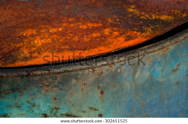 Industrial background\
with warm and cold sections divided by a diagonal curve. The\
abstract close-up composition makes the image an interesting\
textured industrial\
background.\
